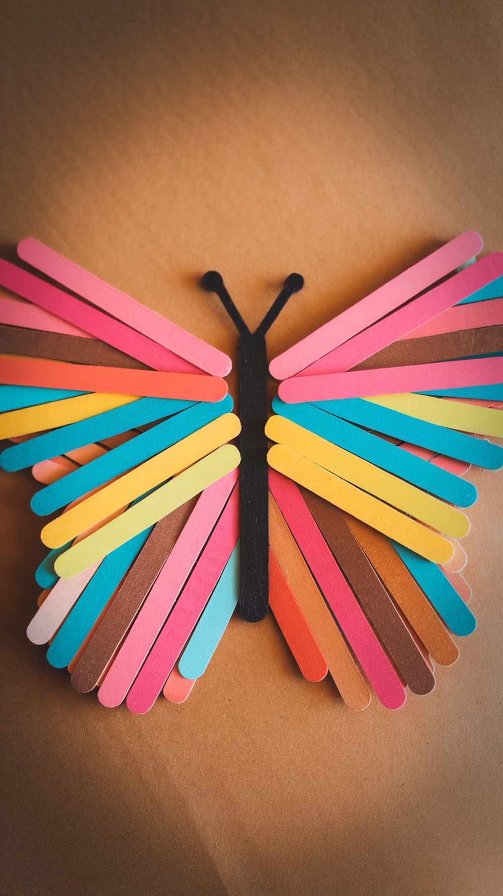 Colorful popsicle stick butterfly craft